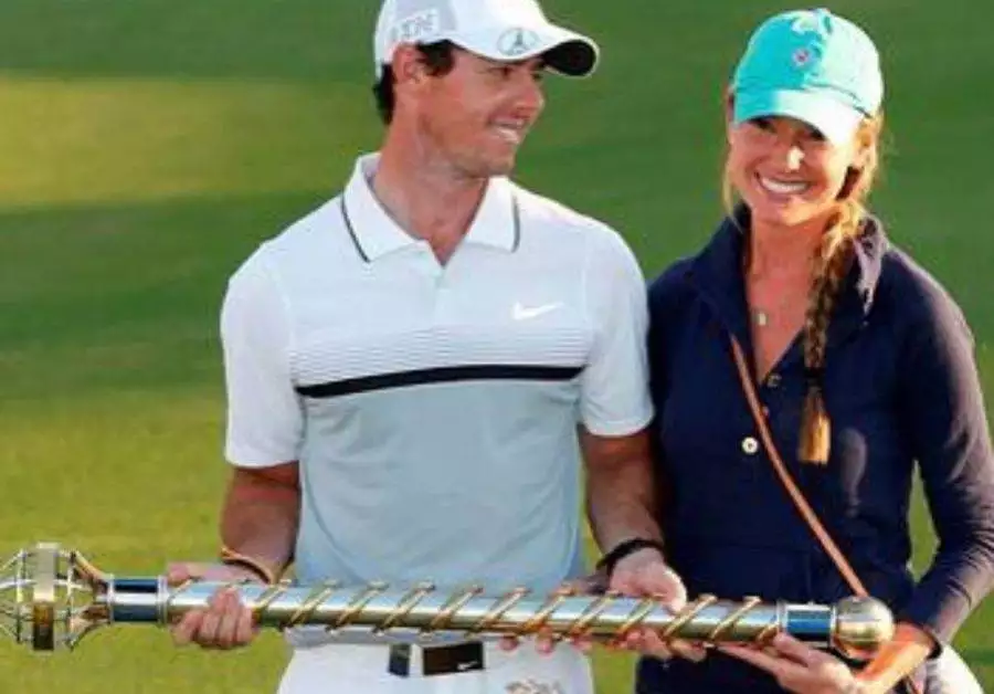 Erica Stoll and Rory McIlroy Trophy