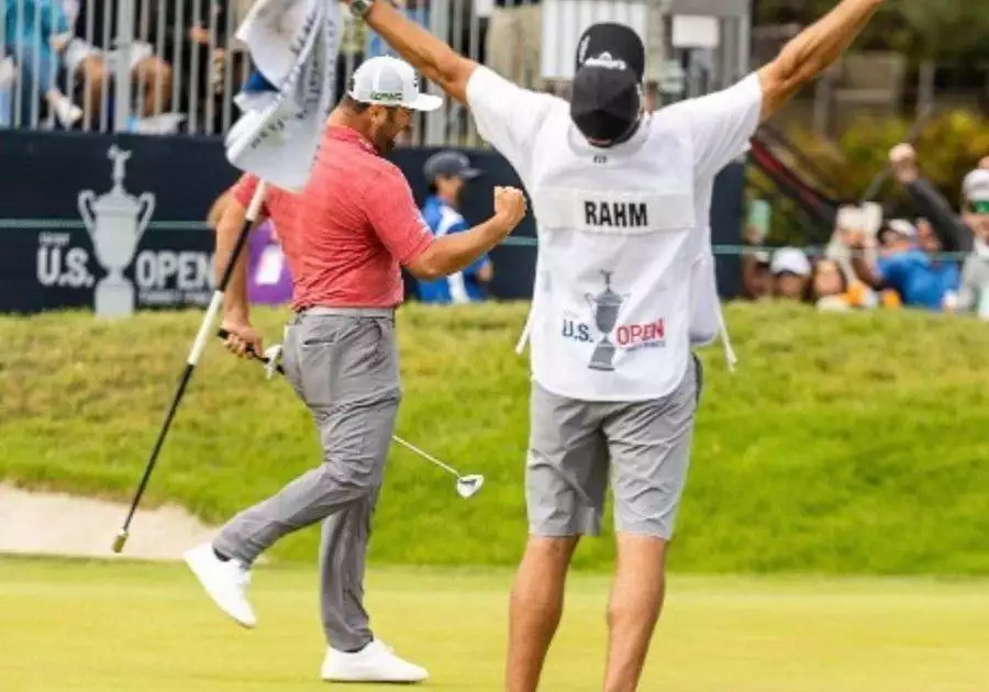 Jon Rahm and Caddie Celebration